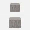Two identical cube-shaped side tables with a marble-like pattern are shown against a plain background. Produktbild-Vorschau