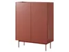 A red cabinet with two doors on thin legs, isolated on a white background. Produktbild-Vorschau