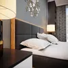 A close-up view of a bed in a bedroom setting. Podgląd zdjęcia produktu