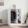 A white wardrobe with clothes hanging inside and folded items on shelves. Náhľad obrázku produktu