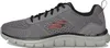 A side view of a single athletic shoe. Voir les images du produit