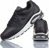 A pair of black Nike Air Max Command leather sneakers are displayed against a white background. Voir les images du produit