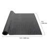 A rolled-up black rubber mat with a diamond plate pattern, shown on a white background with dimensions indicated. Produktbild-Vorschau