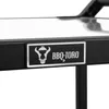 A close-up view of a black grill cart with a silver emblem. Anteprima dell’immagine prodotto