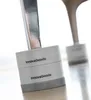 Close-up of the base of two anti-vibration feet for appliances. Anteprima dell’immagine prodotto