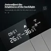 A close-up of a digital thermostat display showing time, temperature, and icons. Podgląd zdjęcia produktu
