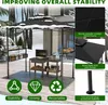 A gazebo set up outdoors in a snowy environment, with a grill and accessories. Voir les images du produit