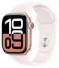 A close-up studio shot of a rose gold Apple Watch with a starlight sport band.