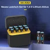 A product shot of a battery charging box with batteries inside and two batteries next to it. Produktbild-Vorschau