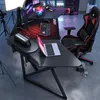 A gaming desk setup with a chair, computer, and accessories. Produktbild-Vorschau