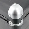 Close-up of a corner of a black aluminum case with silver metal corner protectors. Náhled obrázku produktu