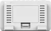 The back of a white digital alarm clock with vents on the sides and a kickstand at the bottom. Produktbild-Vorschau
