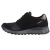 A side view of a black sneaker. Produktbild-Vorschau
