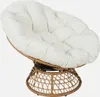 A papasan chair with a white cushion on a woven base. Produktbild-Vorschau