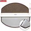 A top-down view of a brown, semi-circular stair mat, with a close-up inset showing the underside with adhesive strips. Produktbild-Vorschau