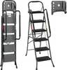 A black metal step stool with multiple steps and a removable tray is shown from different angles. Anteprima dell’immagine prodotto