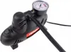 A black car air compressor with a pressure gauge and hose, shown on a white background. Podgląd zdjęcia produktu