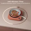 A close-up of an induction cooktop with a pan of food cooking on it, set against a neutral background with graphic elements indicating a timer function. Voir les images du produit