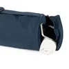 A close-up view of a dark blue duffel bag with a pocket open, revealing a rolled-up white towel and a silver smartphone. Produktbild-Vorschau