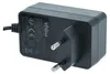 A close-up, angled view of a black AC/DC adapter with visible labeling. Produktbild-Vorschau