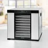 A stainless steel and black food dehydrator is shown on a table in front of a blurred kitchen background. Anteprima dell’immagine prodotto