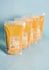 Four bags of powder are lined up diagonally against a light blue background. Produktbild-Vorschau