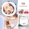A collage of images showing a woman applying makeup with a lighted magnifying mirror, close-ups of an eye and lips, and a standalone view of the mirror. Produktbild-Vorschau