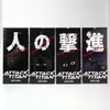 Four volumes of Attack on Titan manga are displayed side-by-side against a white background. Náhľad obrázku produktu