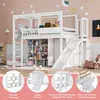 A white loft bed with a slide and shelves, decorated with stars and clouds on a pink wall. Produktbild-Vorschau