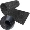 A black anti-vibration mat with white speckles, rolled up and partially unrolled. Produktbild-Vorschau