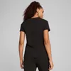 A woman wearing a black Puma t-shirt. Anteprima dell’immagine prodotto