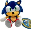 A plush toy of Sonic the Hedgehog is shown sitting down, with a product tag next to it. Produktbild-Vorschau