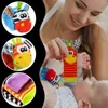 4-tlg. Baby Rassel Set mit Socken und Handgelenkbändern Produktbild-Vorschau 5