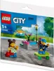 A LEGO City polybag showing a playground scene with two minifigures. Podgląd zdjęcia produktu