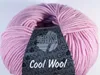 A ball of pink yarn with a label. Produktbild-Vorschau