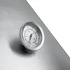 A close-up of a thermometer on a brushed metal surface. Podgląd zdjęcia produktu