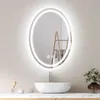 A modern bathroom vanity with a lit oval mirror above a sink. Náhľad obrázku produktu
