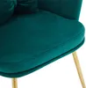A close-up view of the seat cushion and a leg of a teal velvet chair. Anteprima dell’immagine prodotto