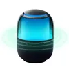 A product shot of a black and blue Bluetooth speaker with blue light emanating from it. Náhled obrázku produktu