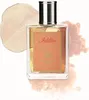 A bottle of perfume is displayed against a background with abstract, smoky orange shapes and a wooden disc. Náhľad obrázku produktu