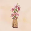A 3D wooden model of sakura flowers in a vase. Náhľad obrázku produktu
