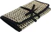 A closed roll-up case for knitting needles, tied with a black ribbon. Produktbild-Vorschau