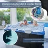 A couple relaxing in an outdoor hot tub. Produktbild-Vorschau