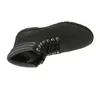 A black Timberland boot shown from a top-down diagonal angle against a white background. Voir les images du produit