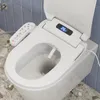 A close-up view of a smart bidet toilet seat with a remote control and a digital display. Podgląd zdjęcia produktu