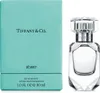 A bottle of Tiffany & Co. Sheer Eau de Toilette and its packaging are displayed against a white background. Náhled obrázku produktu