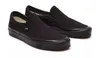 A pair of black Vans Classic Slip-On shoes is shown against a white background. Podgląd zdjęcia produktu