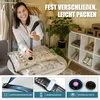 A woman is using a vacuum cleaner to compress a vacuum storage bag filled with bedding. The background shows a room with shelves of shoes and clothing on a rack. Produktbild-Vorschau