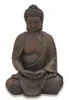 A statue of Buddha sitting in meditation. Produktbild-Vorschau