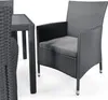 A close-up view of a dark gray rattan outdoor dining set, showing a chair with a cushion and a portion of a table. Náhľad obrázku produktu